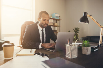 Photo of handsome dark skin business man guy notebook table chatting colleagues read corporate...