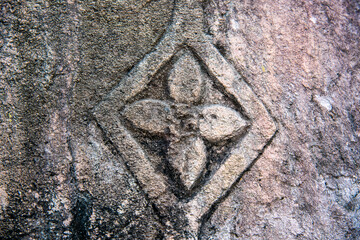 Closeup cement wall with flower petals pattern