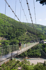 Fototapeta na wymiar 谷瀬の吊り橋と十津川