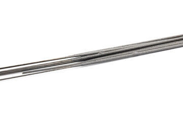 Sparklers sticks in abundance on white isolated background, preparation for christmas