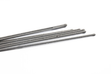 Sparklers sticks in abundance on white isolated background, preparation for christmas