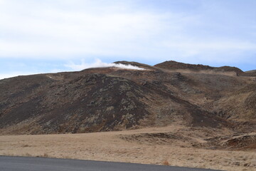 The wild and dramatic landscapes of Iceland with mountains, volcanoes, snow, geysers, waterfalls and hot springs