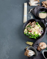 Udon noodles with mushrooms and vegetables