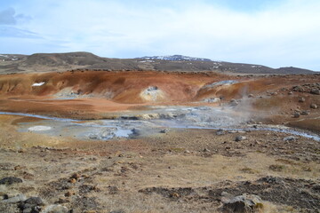 The wild and dramatic landscapes of Iceland with mountains, volcanoes, snow, geysers, waterfalls and hot springs