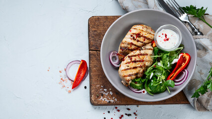 Grilled chicken fillet and vegetable salad