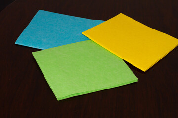 Colored microfiber napkin with dark background, kitchen rag, object