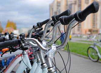 Bicycles in a row on a parking for rent in Saint-Petersburg, life style, city view