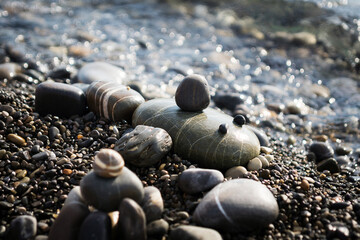 pebbles on the beach on the beach close-up. stone figures
