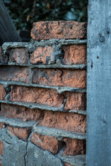 old ruined brickwork and a surface of vintage wooden boards