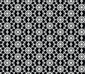 Seamless geometric pattern with the image of New Year's snowflakes. Vector design for holiday web banner, business presentation, brand package, fabric, print, wallpaper, postcards.