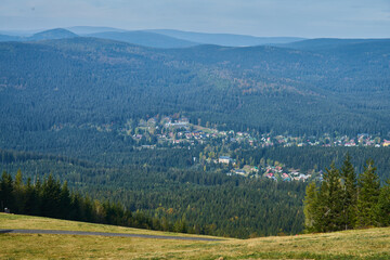 Naklejka premium Panorama of Krkonose mountains and Harrachov from Certova Hora