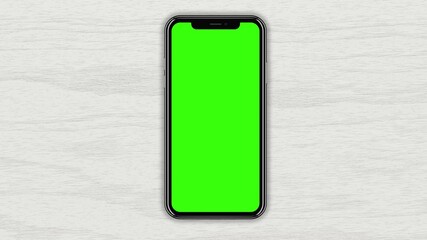 Top view, a smartphone with a green screen on a light wood table, a close-up of a mobile phone. 3D-rendering