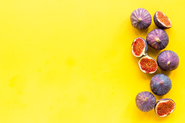 Flat lay of figs on a kitchen table, top view