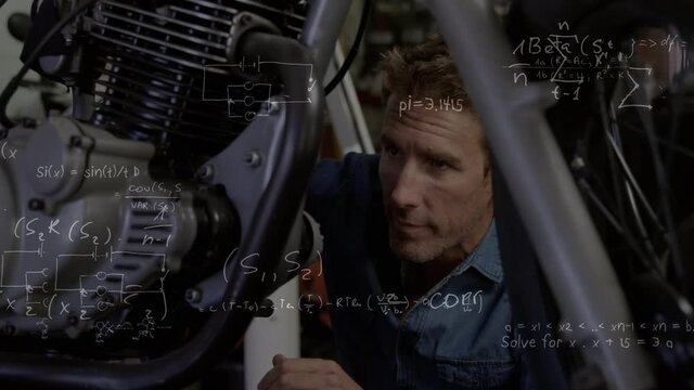 Man reparing motorbike over mathematical equations.