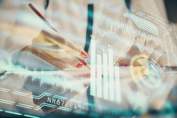 Technology theme hologram over woman's hands taking notes background. Concept of Tech. Double exposure