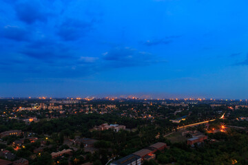 Fototapeta premium Panorama of the evening big industrial city in Eastern Europe