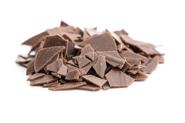 Grated dark chocolate. Chocolate flakes isolated on white background.