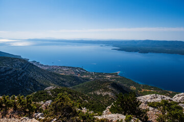 Panoramic top view on beach Zlatni Rat from mountain Vidova Gora. Croatia, Brac island, august 2020.