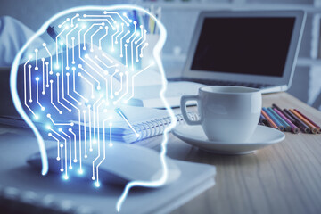 Multi exposure of writing hand on background with brain hologram. Concept of self learning.