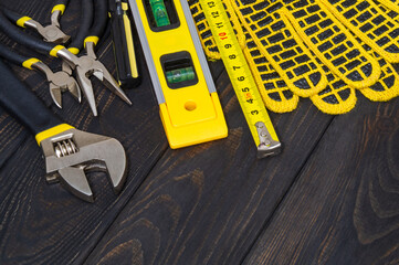 Kit tools for master builder on a black boards. Wizard working environment
