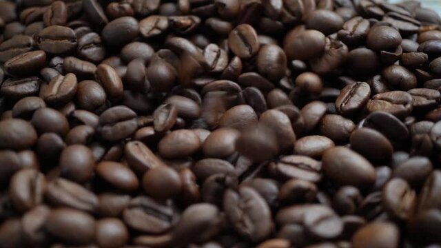 coffee beans falling in slow motion