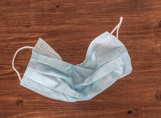 Disposable dirty face mask. Coronavirus.