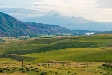 picturesque landscape of Armenia - Mount Big Ararat with a snow-capped peak in the early morning