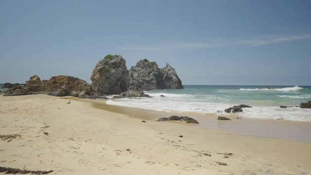 midday shot of camel rock and beach at bermagui on the nsw south coast of australia