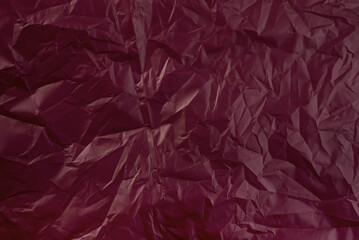 Purple creased wrapper paper background.