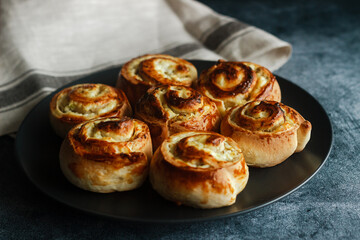 Buns with cottage cheese. Delicious pastries on a plate