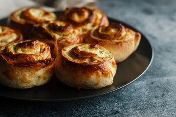 Buns with cottage cheese. Delicious pastries on a plate