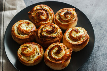 Buns with cottage cheese. Delicious pastries on a plate