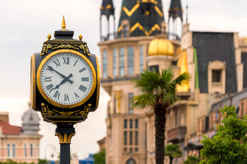 Fototapeta na wymiar Beautiful city clock on a pillar in Batumi.