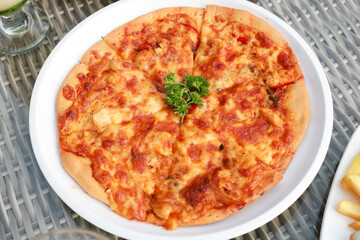 Delicious fresh pizza on table