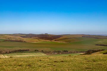 Fototapeta na wymiar A Rural South Downs Landscape, with a Blue Sky Overhead
