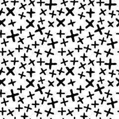 Naklejka premium Seamless pattern. Crosses in a chaotic mess, hand drawn.