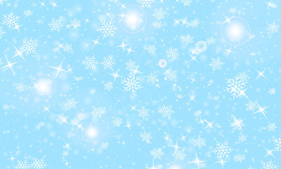 Snow background. Winter snowfall. White snowflakes on blue sky. Christmas background. Falling snow.