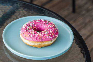 Close up of a tasty donut on a plate