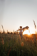 Naklejka premium girl in a wheat field