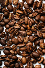 Coffee beans on white background.  Top view, macro photography with place for text.