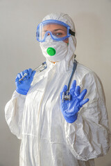Fototapeta premium young woman doctor nurse in protective mask on white background