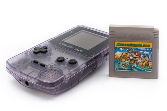 Fukuoka, Japan - june 23, 2019 : the famous nintendo game boy color portable console with Super Mario Land cartridge