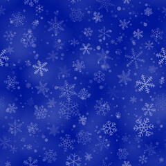 Christmas seamless pattern of snowflakes of different shapes, sizes and transparency, on blue background