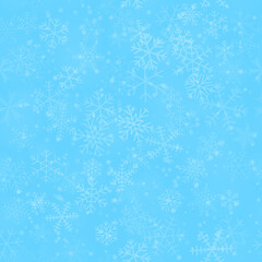 Christmas seamless pattern of snowflakes of different shapes, sizes and transparency, on light blue background