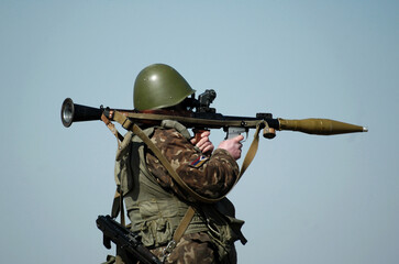 Soldier with antitank grenade launcher and flag of Artsakh and also known as Nagorno-Karabakh...