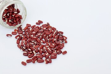 Azuki Beans on white background. Red beans. Raw food.