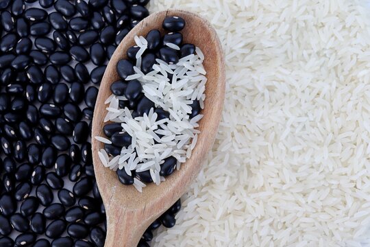 Raw White Rice And Black Beans. Healthy Food. 