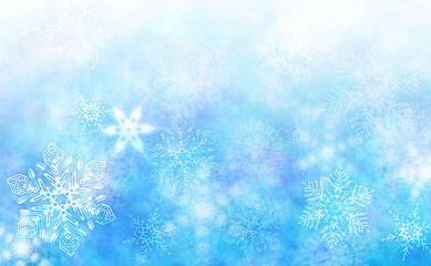 雪の結晶が舞う青い冬の背景