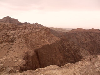 Exploring the archeological site of Petra and the red sandstone landscapes in Jordan