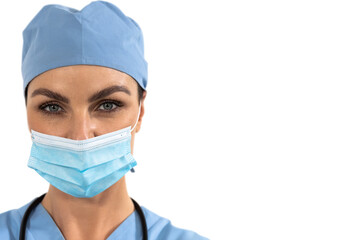 Portrait of female surgeon wearing face mask against white background